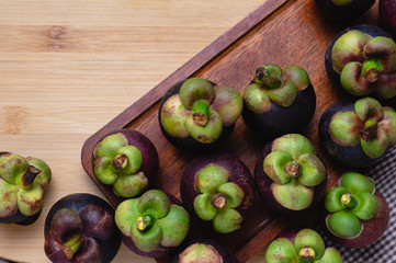 Mangosteen on the wooden floor