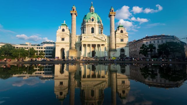 Timelapse view of Karlkirsche church in Vienna with reflections