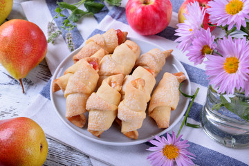 Shortbread rolled cookies with apple and pear jam filling