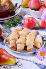 Shortbread rolled cookies with apple and pear jam filling