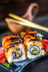 sushi rolls with red fish