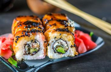 sushi rolls with red fish