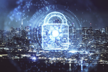 Lock icon hologram on city view with skyscrapers background multi exposure. Data security concept.