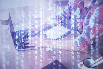 Businessman with computer background with technology theme hologram. Concept of big data. Double exposure.