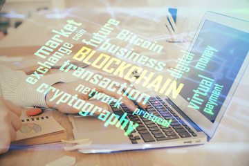 Blockchain theme hud with businessman working on computer on background. Concept of crypto chain. Double exposure.