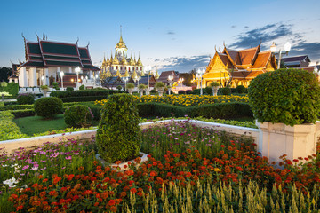 Maha Chetsadabodin Royal Pavilion and Wat Ratchanatdaram or Loha Prasat Metal Castle at twilight, landmark and famous place of Bangkok, Thailand