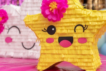 Close up of paper yellow start on party table decoration. Userful for review concept too.