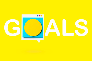 Isolated paper cutout of speech buggle with goals text. Goals banner on yellow background.