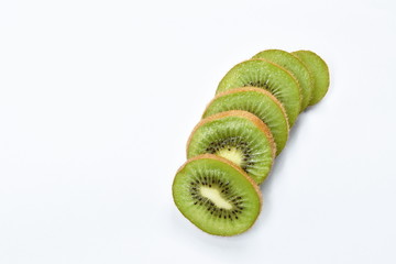 fresh kiwi fruit slice arranging on white background