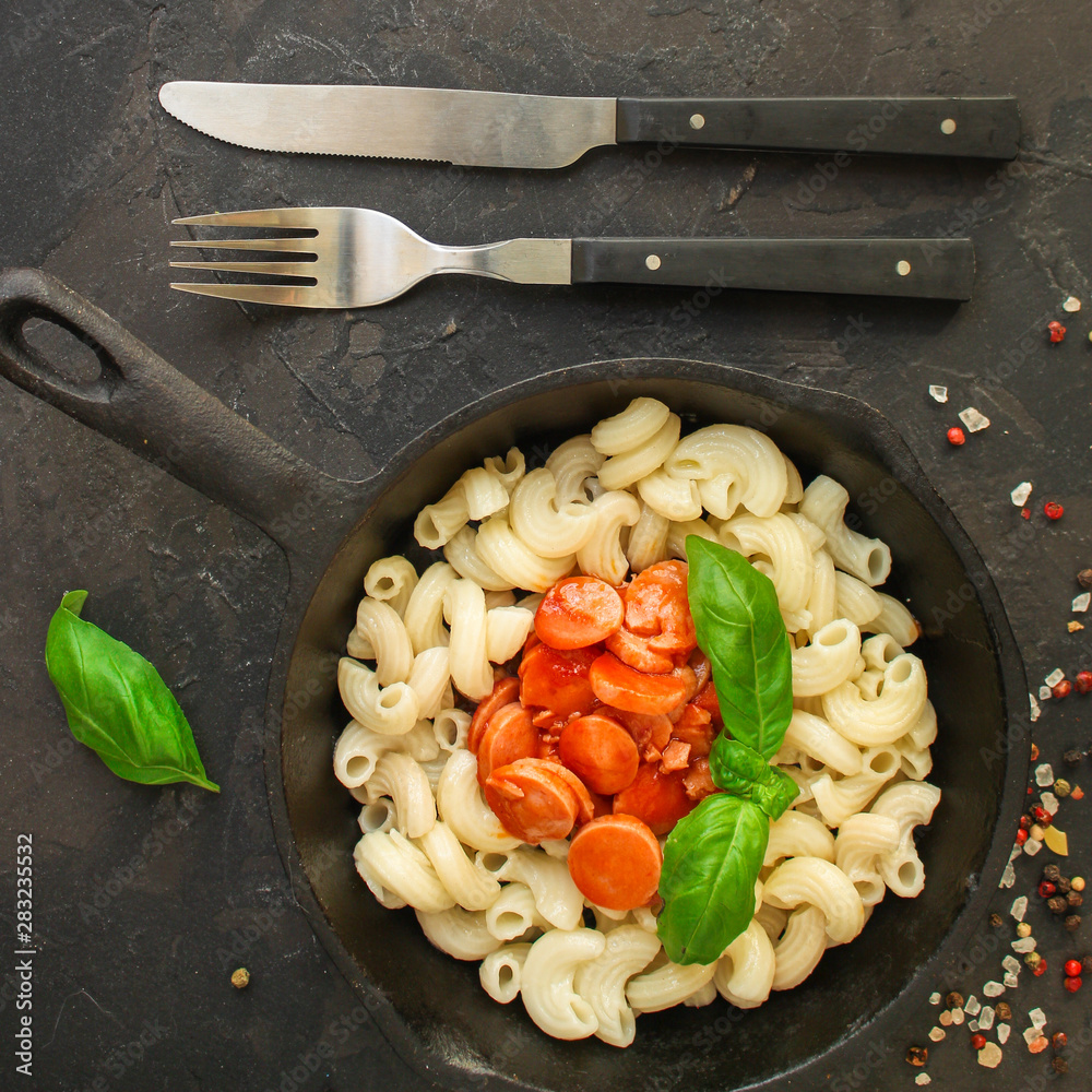 Wall mural pasta with tomato sauce and sausages (cavatappi, elbow, campanelle) serving second course. top food 