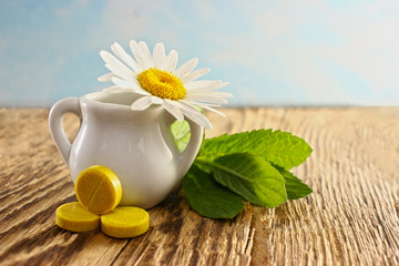 Phytotherapy pills from natural herbs and flowers.  The concept of herbal medicine and dietary supplements, and vitamins.