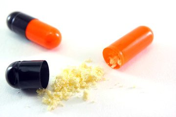 printed tablets package with light table background, one tablet