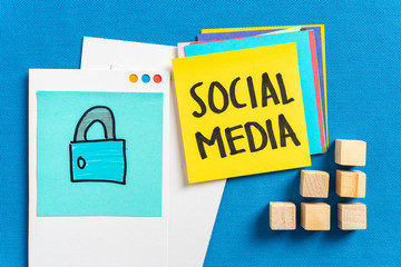 Social media privacy, Internet Security and Safe web surfing concept made with a illustration of padlock and social media text on blue textured background.