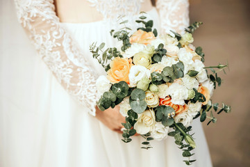 Rustic wedding photo zone. Hand made wedding decorations includes Photo Booth, wooden barrels and boxes, lanterns, suitcases and white flowers