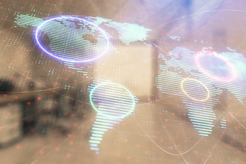 World map with trading desk bank office interior on background. Multi exposure. Concept of international finance