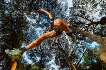 Man jumping in the forest