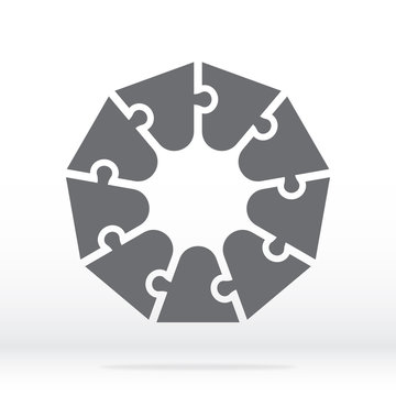 Simple icon polygonal puzzle in gray. Simple enneagon puzzle  of nine pieces  on gray background. Flat design. Vector illustration EPS10. 