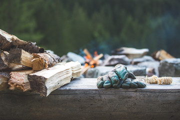 Making a bonfire: Small flame on a camping trip, adventure outdoors