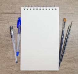 Flat lay women mockup notepad. Top view female workspace, beauty blogger girls wood desktop