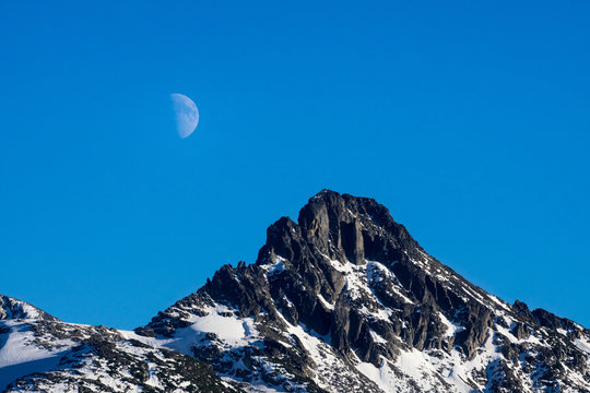 Moon rising over the scenic mountain range near garibaldi lake, Canada, BC