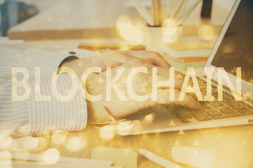 Blockchain theme hud with businessman working on computer on background. Concept of crypto chain....