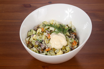 Traditional Russian salad with meat
