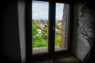 Fototapeta na wymiar Window view of the old city.