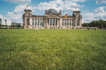 Meadow in front of the Reichstag building ( the German Bundestag ) in Berlin ,Germany