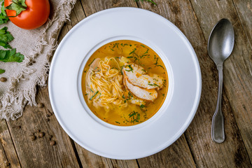 Chicken soup bouillon in a plate