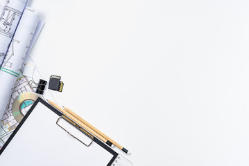 Architectural plans, pencil and ruler on the table. Place for your text