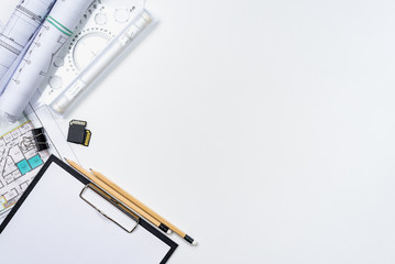 Architectural plans, pencil and ruler on the table. Place for your text