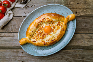 ajara Khachapuri georgian kitchen on old wooden table