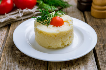 mashed potatoes on wooden table