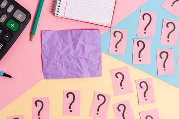 Mathematics stuff and writing equipment above pastel colours background