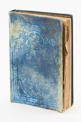 Antique dirty blue book on white background