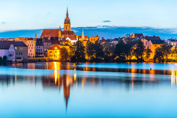 Fototapeta na wymiar Jindrichuv Hradec panoramic cityscape with Vajgar pond in the foreground. Czech Republic