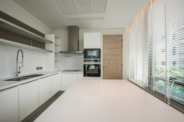 Modern kitchen interior with electric and microwave oven