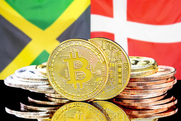 bitcoins on Jamaica and Denmark flag background