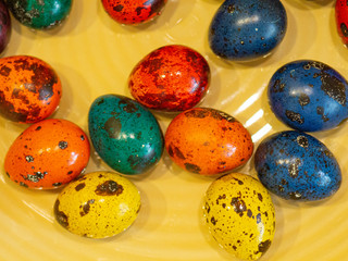 Fototapeta na wymiar Easter holiday.colored eggs are on the table at the time of painting