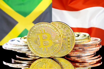 bitcoins on Jamaica and Austria flag background
