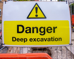Hazard warning sign of a deep excavation