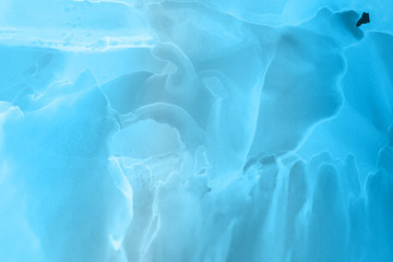 Hand painted blue alcohol ink background. Abstract delicate winter season texture. Contemporary wallpaper. 