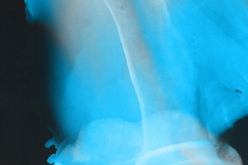 Hand painted blue alcohol ink background. Abstract delicate winter season texture. Contemporary wallpaper. 