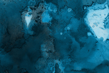 Hand painted blue alcohol ink background. Abstract delicate winter season texture. Contemporary wallpaper. 