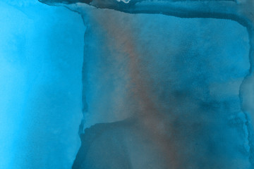 Hand painted blue alcohol ink background. Abstract delicate winter season texture. Contemporary wallpaper. 