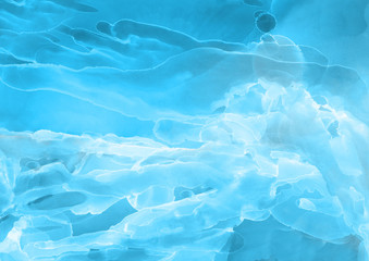 Hand painted blue alcohol ink background. Abstract delicate winter season texture. Contemporary wallpaper. 