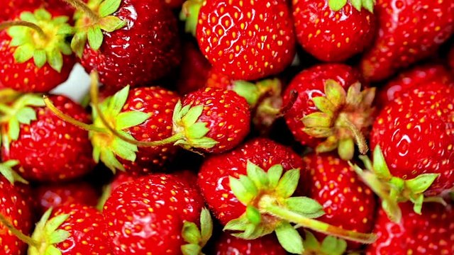 Fresh Fruits Appetizing and Beautiful Strawberries as Food Background. Organic Healthy Ripe Strawberry Nutrition.