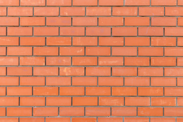 background of neatly stacked red bricks