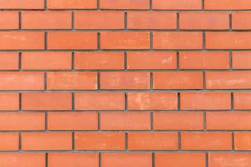 Fototapeta premium background of neatly stacked red bricks