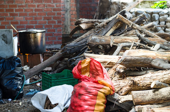 Traditional clay stove of the Andes, kitchen tool, traditional wood-burning  stove, firewood and raw potatoes Stock Photo | Adobe Stock